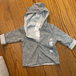 Brand new with tags reversible light jacket 6-12 months